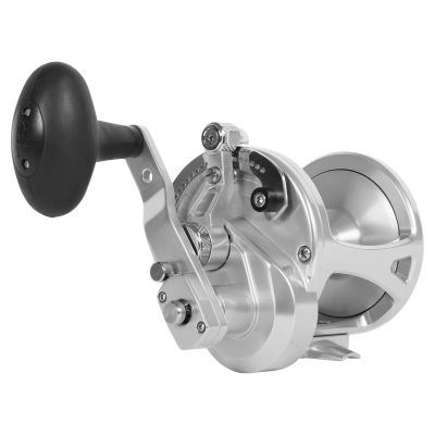 Avet LX G2 6/3 Magic Cast Two Speed Reel with Glide Plate with silver-colored body, spool, reel foot, lever drag arm and handle arm with silver accents and black oval handle.