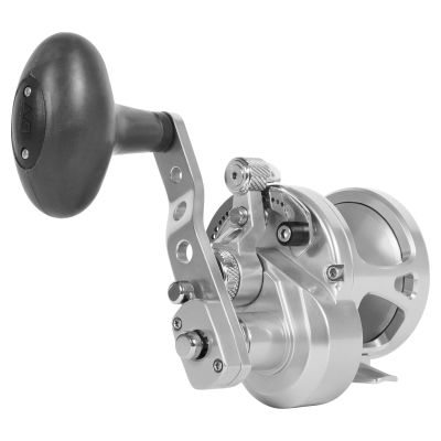 Avet SXJ G2 6/4 Magic Cast Two Speed Reel with Glide Plate with silver-colored body, spool, reel foot, lever drag arm and handle arm with silver accents and black oval handle.