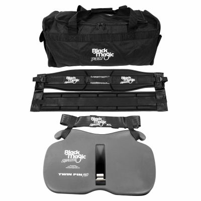 Black Magic Twin Pin Pro Equalizer Set - Black Magic Equalizer XL Wide Twin Pin Pro harness kit with padded black waist belts, grey gimbal plate, shoulder straps, and a large zippered gear bag, all labeled with white branding text.