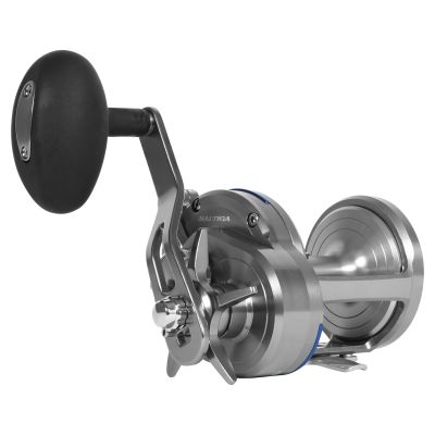 3/4 handle side view of the Daiwa Saltiga 50HA Star Drag Reel showing silver-colored metal body, oversized oval power handle, star drag system, SALTIGA 50HA branding on the side plate, and blue trim accents.