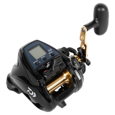 Daiwa Tanacom S500J Power Assist Electric Reel, black electric fishing reel with a gold-colored spool and gold-colored handle arm, black oversized handle knob, and an LCD display with text "PICKUP" "RESET" "MODE" "MEMO"