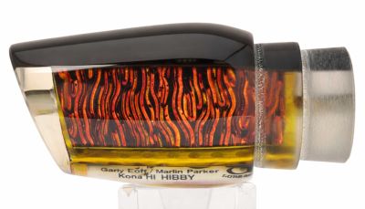 Marlin Magic Hibby Lure - #15 – Black top trolling lure with a goldish-red and yellow dichro insert.