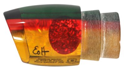 Marlin Magic Smokey Joe - #13 - Rasta color trolling lure with orange-yellow tint and red stripes, angled-face, shell insert, and a red eye.