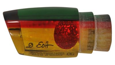 Marlin Magic XL Ruckus - #18 - Rasta color trolling lure with orange-yellow tint and red stripes, angled-face, shell insert, and a red eye.