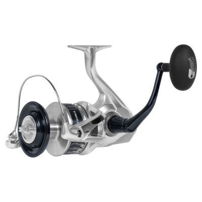 Shimano Saragosa 25000SWA Spinning Reel, 3/4 handle side view showing silver body with dark blue accents, large oval grip, and front drag spool. &ldquo;Saragosa SW&rdquo; and &ldquo;25000&rdquo; visible on spool.
