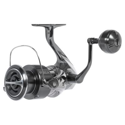 Shimano Stella FK STLC5000XGFK spinning reel, front 3/4 view, silver-colored and black spinning reel with round spool, bail wire, and handle with round black knob, text "STELLA" in light gray-colored text