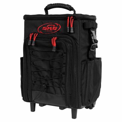 SKB Tak-Pak backpack in black with red zipper pulls and embroidered &ldquo;SKB Fishing&rdquo; logo on top pocket, featuring multiple zippered compartments, side pouches, bungee cord front, handle, and wheels.