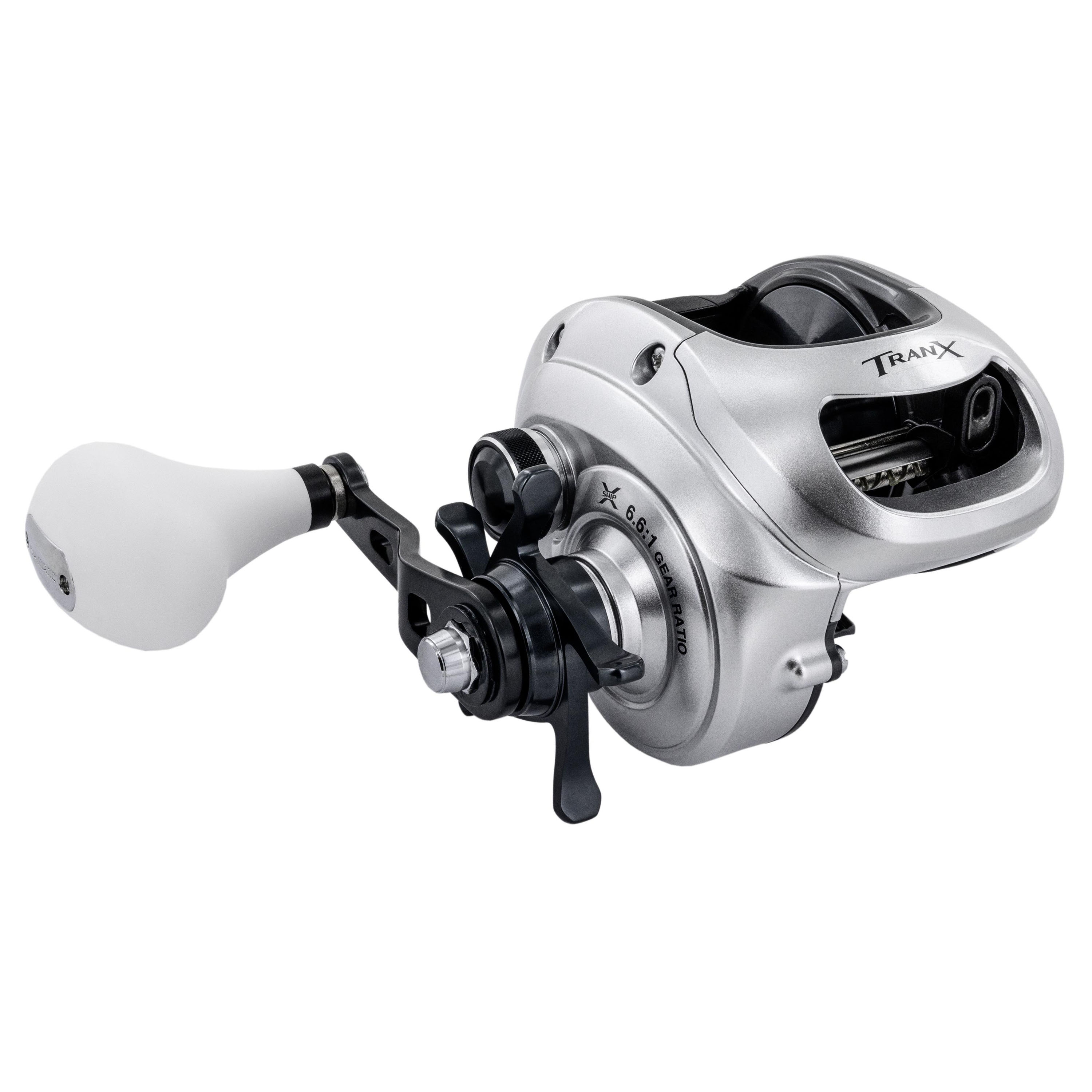 Shimano Tranx TRX500HG Baitcasting Reel has a silver color body. The handle knob is white. The star drag and spool is black. The TRANX text can be seen on the front of the reel, near the top.