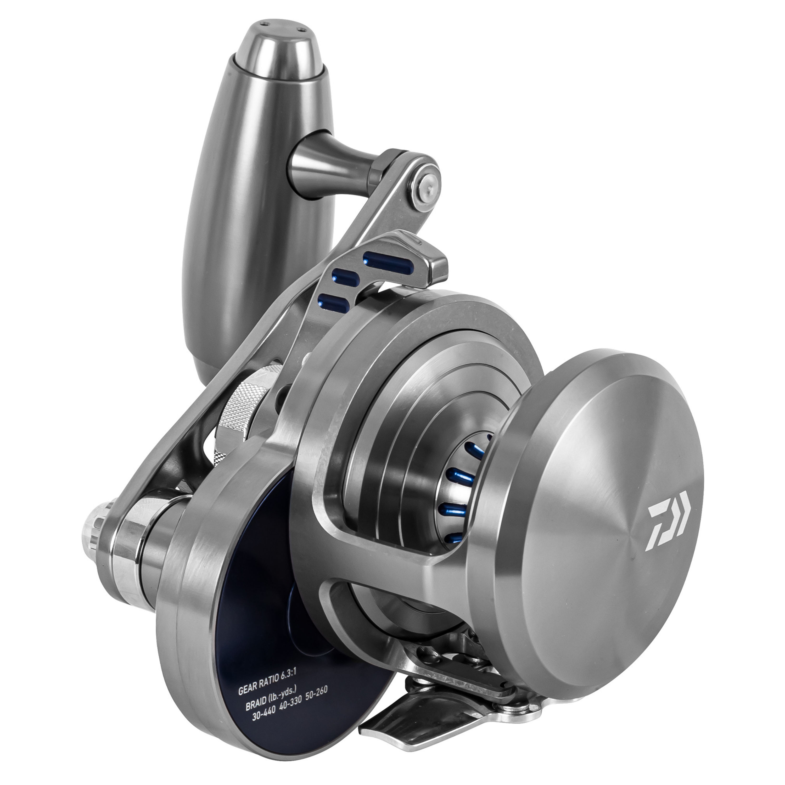 Daiwa Saltiga single-speed jigging reel with sleek silver frame, blue ported accents, large round side plate engraved with Daiwa logo, exposed deep spool, oversized tapered handle knob, and gear specs labeled on dark blue lower panel.