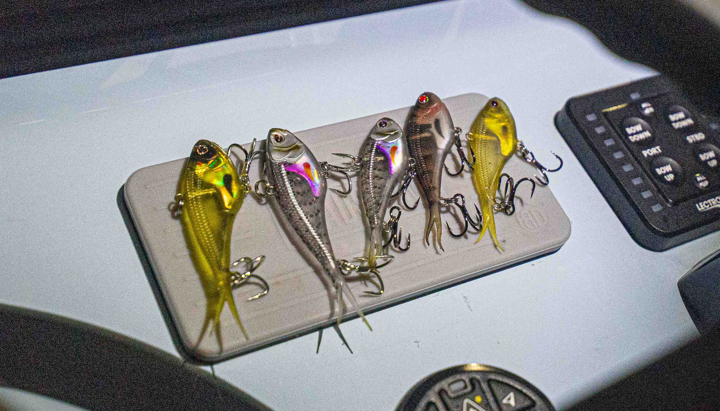 How to Vibe for Snook: The Gear, Technique, and Tackle I Trust image featuring five Nomad Design Vertrex Max Vibe jigs in assorted colors.