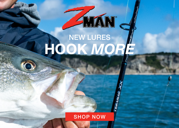 Close-up of an angler holding a fish beside a fishing rod over blue water with the text New Lures Hook More Z-Man and a Shop Now call to action