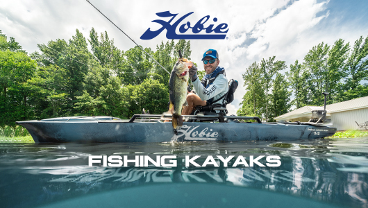 Hobie Fishing Kayaks. Shop Now. Background shows a man fishing on a blue Hobie kayak.